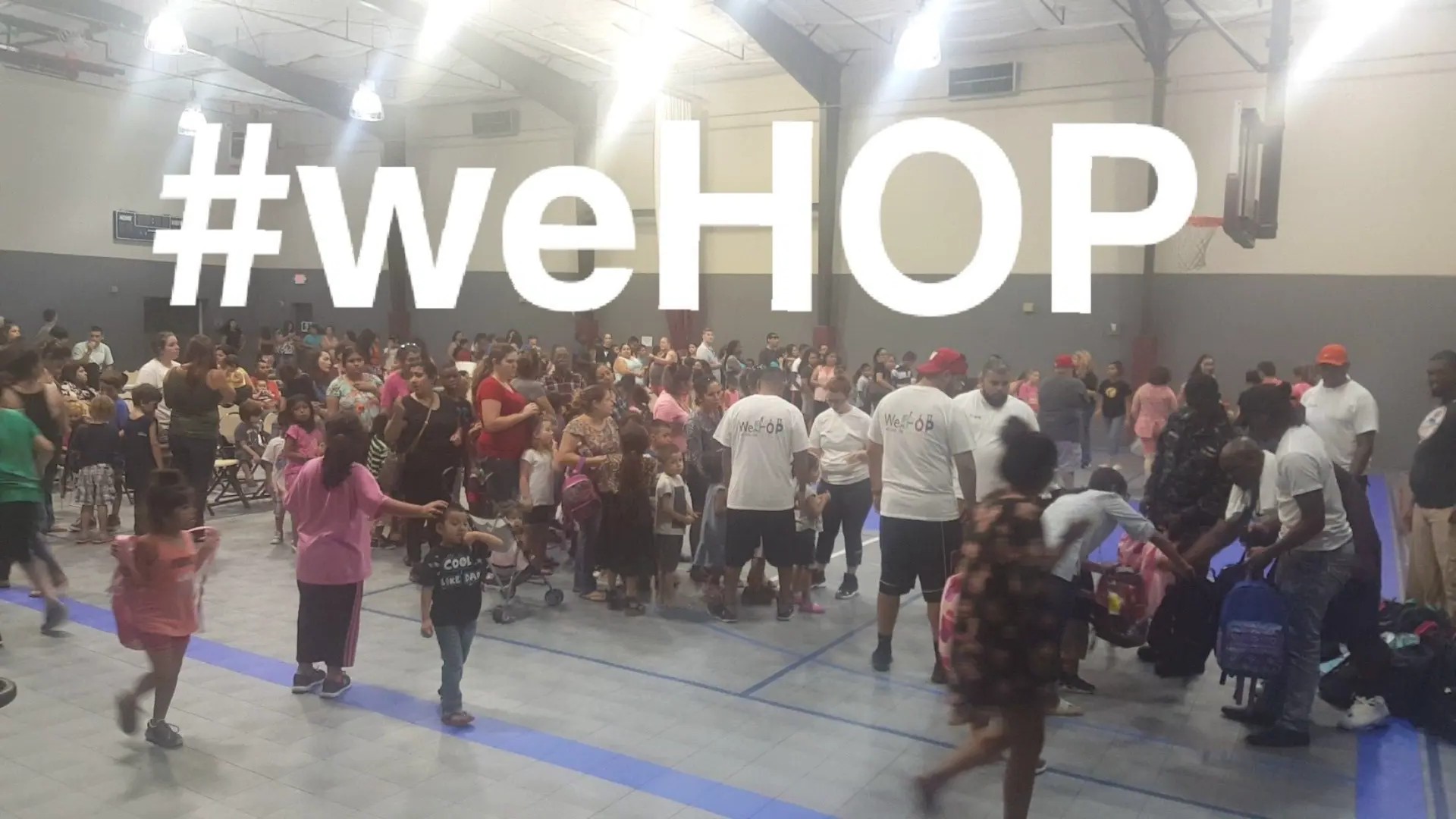 WeHOP community gathering in a gymnasium